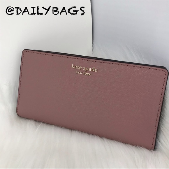 kate spade Handbags - KATE SPADE PINK LARGE SLIM BIFOLD WALLET PEONY